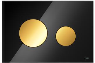 Betätigungsplatte in schwarz und Tasten in gold